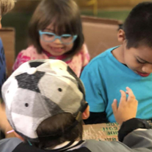 aac students at a table working together