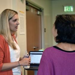 Dr. Maryssa Kucskar Mitsch speaking with student